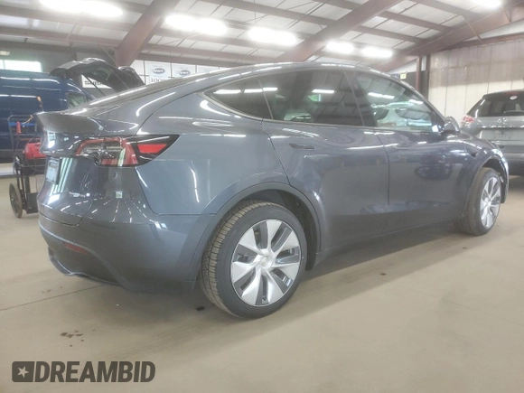 2023 Tesla Model Y Long Range z VIN 7SAYGDEE6PA179733, wystawiony jako Copart lot #58399015 z przebiegiem 45 780 mil mil oraz Szkoda całkowita • Salvage title. Historia ofert i sprzedaży dostępna na DreamBid. Obrazek 3.