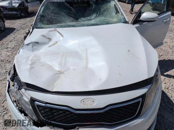 2013 Kia Optima SX с VIN 5XXGR4A6XDG091796, выставлен на аукционе Copart как лот 60294155 с пробегом Не указан миль и Списание • Salvage title. История ставок и продаж доступна на DreamBid. Изображение 11.