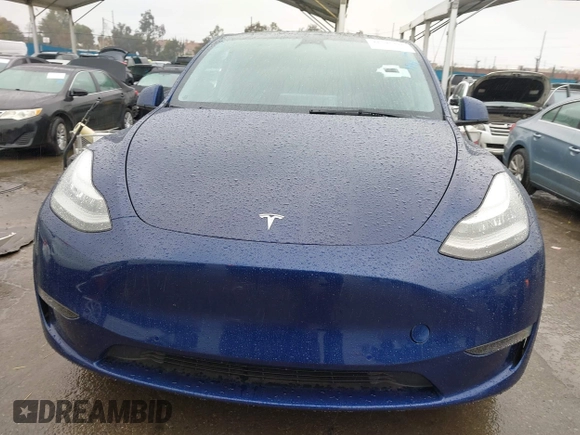 2022 Tesla Model Y Long Range with VIN 7SAYGDEE8NF511395, listed as a IAAI auction lot 41595310 with 65,156 mi miles and . Bid and sale history available at DreamBid. Image 12.