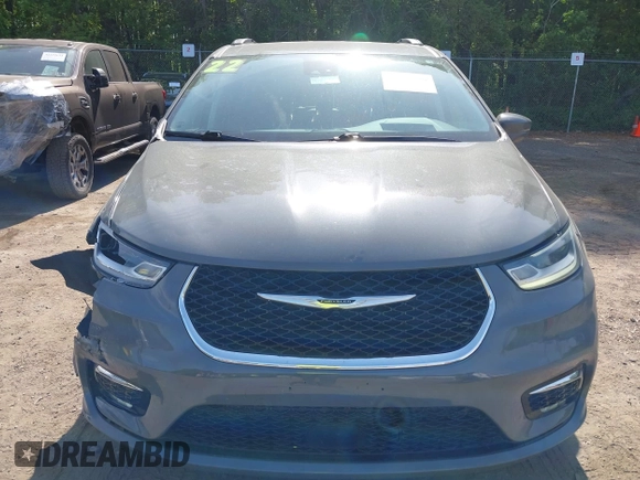 2022 Chrysler Pacifica Touring L with VIN 2C4RC1BG3NR168565, listed as a IAAI auction lot 42150290 with 61,750 mi miles and . Bid and sale history available at DreamBid. Image 12.