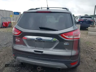 2013 Ford Escape SEL with VIN 1FMCU9HX4DUC75565, listed as a IAAI auction lot 42574351 with 180,876 mi miles and . Bid and sale history available at DreamBid. Image 17.