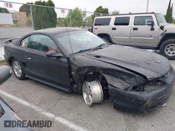 1994 Ford Mustang GT z VIN 1FALP42T0RF147393, wystawiony jako IAAI lot #42046032 z przebiegiem 184 504 mil mil oraz . Historia ofert i sprzedaży dostępna na DreamBid. Obrazek 14.