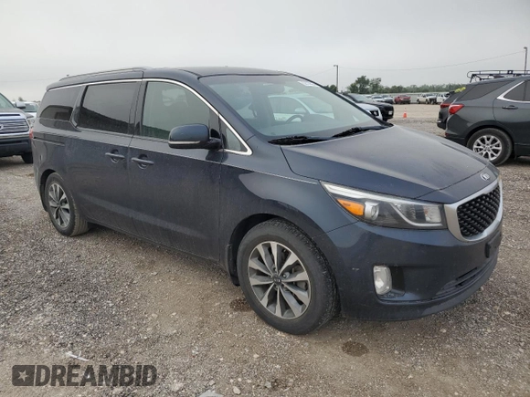 2015 Kia Sedona SX with VIN KNDMC5C17F6036123, listed as a Copart auction lot 58172094 with 128,585 mi miles and Clean Title. Bid and sale history available at carsss.com. Image 4.