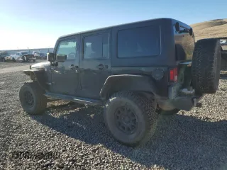 2018 Jeep Wrangler Unlimited Rubicon Recon with VIN 1C4BJWFGXJL899785, listed as a Copart auction lot 50102975 with 114,926 mi miles and Salvage Title. Bid and sale history available at DreamBid. Image 2.