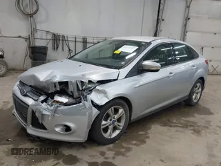 2013 Ford Focus SE z VIN 1FADP3F26DL232202, wystawiony jako IAAI lot #42713387 z przebiegiem 91 035 mil mil oraz . Historia ofert i sprzedaży dostępna na DreamBid. Obrazek 2.