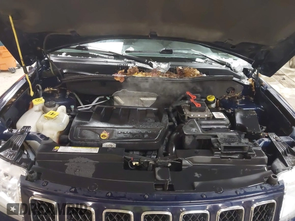 2012 Jeep Compass Latitude with VIN 1C4NJDEB8CD588277, listed as a IAAI auction lot 41511408 with 114,965 mi miles. Bid and sale history available at carsss.com. Image 10.
