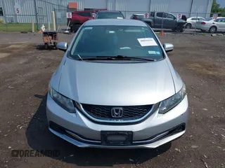 2014 Honda Civic LX z VIN 2HGFB2F53EH500547, wystawiony jako IAAI lot #40016556 z przebiegiem 125 540 mil mil oraz . Historia ofert i sprzedaży dostępna na DreamBid. Obrazek 12.