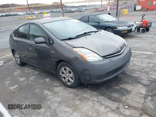 2007 Toyota Prius z VIN JTDKB20U573270996, wystawiony jako IAAI lot #41511437 z przebiegiem 231 659 mil mil oraz . Historia ofert i sprzedaży dostępna na DreamBid. Obrazek 1.