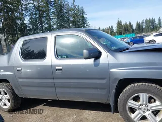 2009 Honda Ridgeline RTL with VIN 5FPYK16599B100707, listed as a IAAI auction lot 41877598 with 130,622 mi miles and . Bid and sale history available at DreamBid. Image 13.