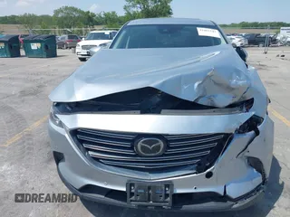 2020 Mazda CX-9 Touring with VIN JM3TCBCY2L0415513, listed as a IAAI auction lot 42481543 with 47,294 mi miles and . Bid and sale history available at DreamBid. Image 12.