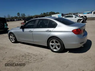 2013 BMW 3 Series 320i with VIN WBA3B1C50DK128525, listed as a Copart auction lot 48618015 with 124,304 mi miles and Salvage Title. Bid and sale history available at carsss.com. Image 2.