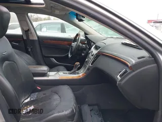 2008 Cadillac CTS AWD w/1SB with VIN 1G6DT57VX80174891, listed as a IAAI auction lot 39161303 with 116,089 mi miles. Bid and sale history available at carsss.com. Image 5.