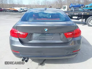 2016 BMW 4 Series 428i xDrive with VIN WBA4C9C56GG140427, listed as a IAAI auction lot 41886670 with 94,426 mi miles and . Bid and sale history available at carsss.com. Image 16.