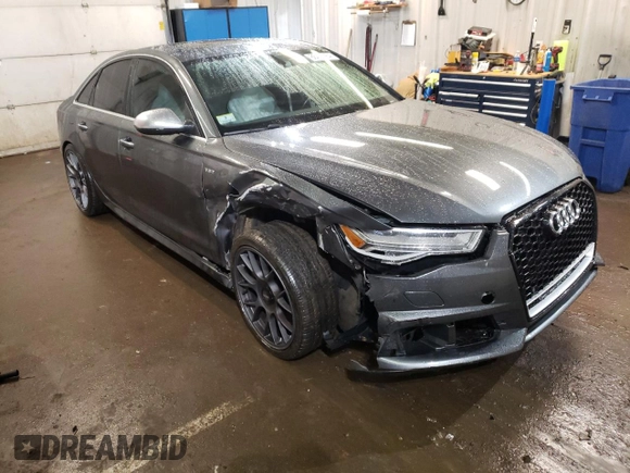 2016 Audi S6 Premium Plus z VIN WAUF2AFC4GN100284, wystawiony jako Copart lot #86496964 z przebiegiem 100 537 mil mil oraz Szkody całkowita. Historia ofert i sprzedaży dostępna na DreamBid. Obrazek 4.