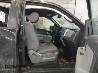 2014 Ford F-150 XL with VIN 1FTFX1ET8EKE32412, listed as a IAAI auction lot 41557331 with 128,744 mi miles. Bid and sale history available at carsss.com. Image 5.
