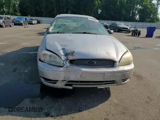 2006 Ford Taurus SE с VIN 1FAFP53UX6A124156, выставлен на аукционе Copart как лот 62056905 с пробегом 121 043 миль миль и Списание • Salvage title. История ставок и продаж доступна на DreamBid. Изображение 13.