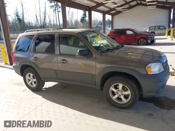 2006 Mazda Tribute i with VIN 4F2YZ02Z26KM12180, listed as a IAAI auction lot 41959606 with 228,217 mi miles and . Bid and sale history available at DreamBid. Image 13.