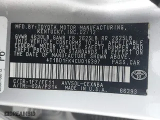 2012 Toyota Camry Hybrid XLE with VIN 4T1BD1FK4CU016397, listed as a IAAI auction lot 40642360 with 118,975 mi miles. Bid and sale history available at carsss.com. Image 9.
