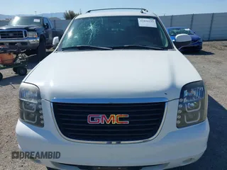 2007 GMC Yukon XL SLT with VIN 1GKFC16007R427817, listed as a IAAI auction lot 41836223 with 154,599 mi miles. Bid and sale history available at carsss.com. Image 6.