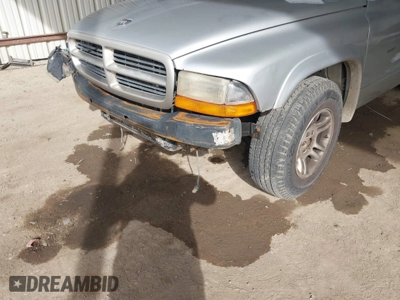 2002 Dodge Dakota z VIN 1B7FL36X42S532446, wystawiony jako IAAI lot #41683398 z przebiegiem 245 626 mil mil oraz . Historia ofert i sprzedaży dostępna na DreamBid. Obrazek 6.