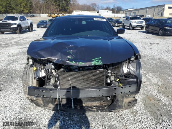 2023 Dodge Charger SXT with VIN 2C3CDXJG6PH675710, listed as a Copart auction lot 85317954 with 12,034 mi miles and Salvage Title. Bid and sale history available at carsss.com. Image 5.