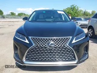2021 Lexus RX with VIN 2T2AZMAA2MC196524, listed as a IAAI auction lot 42017362 with 80,922 mi miles. Bid and sale history available at carsss.com. Image 12.