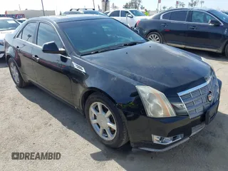 2008 Cadillac CTS RWD w/1SB with VIN 1G6DR57V280153578, listed as a IAAI auction lot 41615630 with 169,327 mi miles. Bid and sale history available at carsss.com. Image 1.