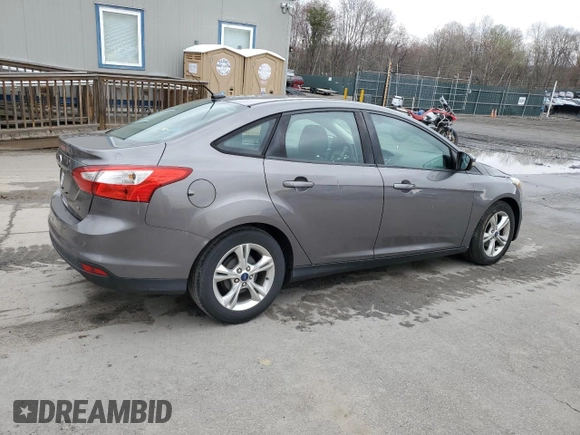 2014 Ford Focus SE with VIN 1FADP3F27EL179253, listed as a Copart auction lot 52913225 with 106,292 mi miles and Salvage Title. Bid and sale history available at DreamBid. Image 3.