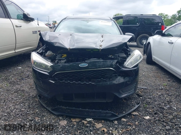 2018 Ford Focus SE with VIN 1FADP3F24JL248653, listed as a IAAI auction lot 42416377 with 113,856 mi miles and . Bid and sale history available at DreamBid. Image 12.