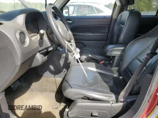 2014 Jeep Patriot Latitude with VIN 1C4NJPFA0ED856877, listed as a Copart auction lot 50406735 with 154,788 mi miles and Salvage Title. Bid and sale history available at carsss.com. Image 7.
