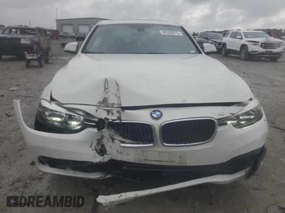 2016 BMW 3 Series 320i xDrive z VIN WBA8E5G54GNU20471, wystawiony jako Copart lot #60558675 z przebiegiem 79 978 mil mil oraz Szkoda całkowita • Salvage title. Historia ofert i sprzedaży dostępna na DreamBid. Obrazek 5.