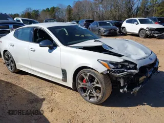 2019 Kia Stinger GT with VIN KNAE35LC8K6050559, listed as a IAAI auction lot 41699927 with 85,944 mi miles. Bid and sale history available at carsss.com. Image 1.
