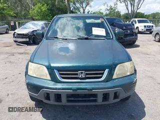 2000 Honda CR-V SE z VIN JHLRD1870YS009867, wystawiony jako IAAI lot #42399220 z przebiegiem 254 367 mil mil oraz . Historia ofert i sprzedaży dostępna na DreamBid. Obrazek 12.