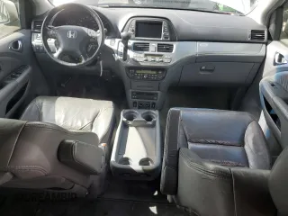 2005 Honda Odyssey Touring z VIN 5FNRL38835B071258, wystawiony jako Copart lot #57878295 z przebiegiem 143 474 mil mil oraz Szkoda całkowita • Salvage title. Historia ofert i sprzedaży dostępna na DreamBid. Obrazek 8.