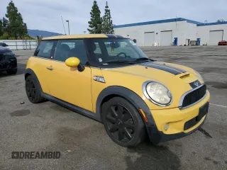2009 MINI Hardtop S with VIN WMWMF73599TW87679, listed as a Copart auction lot 46863725 with 102,976 mi miles and Salvage title. Bid and sale history available at DreamBid. Image 4.
