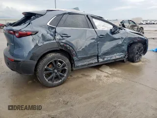 2023 Mazda CX-30 S Carbon Edition with VIN 3MVDMBCM7PM534442, listed as a Copart auction lot 60341565 with 15,068 mi miles and Salvage title. Bid and sale history available at DreamBid. Image 3.