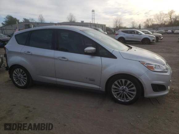 2017 Ford C-Max Energi SE with VIN 1FADP5EUXHL103562, listed as a Copart auction lot 78497513 with 56,983 mi miles. Bid and sale history available at carsss.com. Image 4.