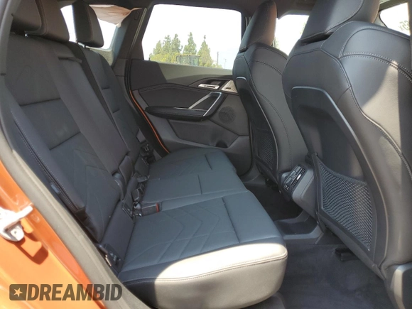 2023 BMW X1 xDrive28i with VIN WBX73EF03P5W54209, listed as a Copart auction lot 64796365 with 19,591 mi miles and Salvage title. Bid and sale history available at DreamBid. Image 11.