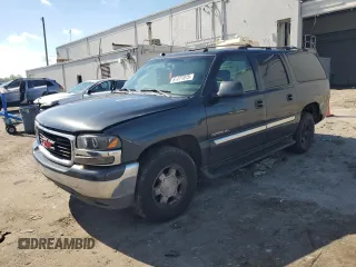 2004 GMC Yukon XL SLT z VIN 3GKFK16Z84G300679, wystawiony jako Copart lot #61177075 z przebiegiem Nie podano mil oraz Szkoda całkowita • Salvage title. Historia ofert i sprzedaży dostępna na DreamBid. Obrazek 1.