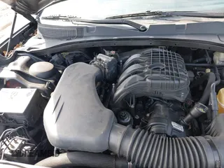 2014 Dodge Charger SE with VIN 2C3CDXBG4EH268898, listed as a IAAI auction lot 41790753 with 318,732 mi miles and . Bid and sale history available at DreamBid. Image 10.