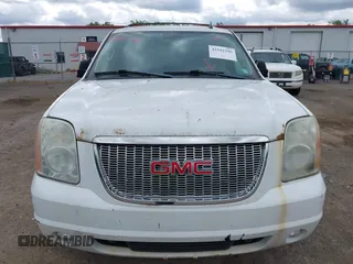 2011 GMC Yukon SLT z VIN 1GKS2CE07BR207565, wystawiony jako IAAI lot #42542596 z przebiegiem 217 759 mil mil oraz . Historia ofert i sprzedaży dostępna na DreamBid. Obrazek 13.
