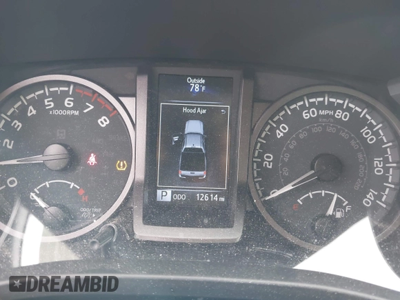 2023 Toyota Tacoma SR z VIN 3TMCZ5AN1PM637609, wystawiony jako IAAI lot #40345917 z przebiegiem 12 614 mil mil oraz . Historia ofert i sprzedaży dostępna na DreamBid. Obrazek 7.