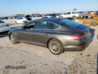2023 Genesis G80 2.5T with VIN KMTGB4SC4PU185035, listed as a Copart auction lot 52082005 with 45,868 mi miles and Salvage title. Bid and sale history available at DreamBid. Image 2.