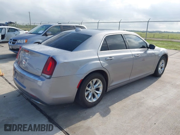 2016 Chrysler 300 Anniversary Edition with VIN 2C3CCAAG9GH211875, listed as a IAAI auction lot 42052083 with 209,251 mi miles and . Bid and sale history available at DreamBid. Image 4.