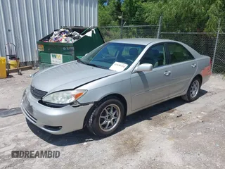 2002 Toyota Camry LE z VIN 4T1BE32K02U630523, wystawiony jako IAAI lot #42330724 z przebiegiem 138 459 mil mil oraz . Historia ofert i sprzedaży dostępna na DreamBid. Obrazek 2.