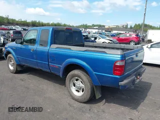 2002 Ford Ranger XLT Off-Road with VIN 1FTZR45U22TA46267, listed as a IAAI auction lot 42626509 with 76,647 mi miles and . Bid and sale history available at DreamBid. Image 3.