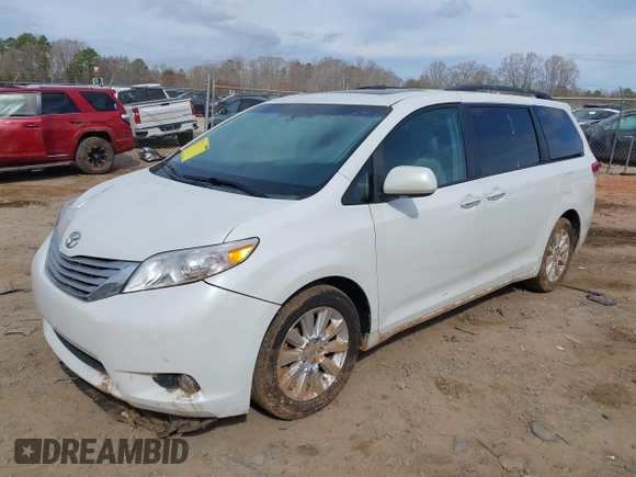 2012 Toyota Sienna XLE with VIN 5TDDK3DC3CS041984, listed as a IAAI auction lot 41711974 with 149,879 mi miles. Bid and sale history available at carsss.com. Image 2.