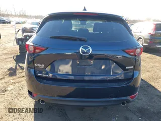 2017 Mazda CX-5 Grand Touring with VIN JM3KFBDL0H0104806, listed as a IAAI auction lot 41621964 with 60,728 mi miles. Bid and sale history available at carsss.com. Image 17.