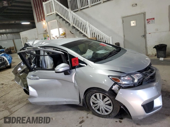 2015 Honda Fit LX with VIN 3HGGK5H53FM748495, listed as a Copart auction lot 86590994 with 124,000 mi miles and Salvage Title. Bid and sale history available at carsss.com. Image 4.