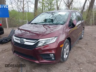 2018 Honda Odyssey EX-L z VIN 5FNRL6H71JB072363, wystawiony jako IAAI lot #41954744 z przebiegiem 104 820 mil mil oraz . Historia ofert i sprzedaży dostępna na DreamBid. Obrazek 2.